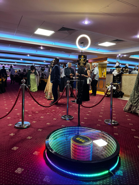 360 photo booth with LED platform at a corporate event